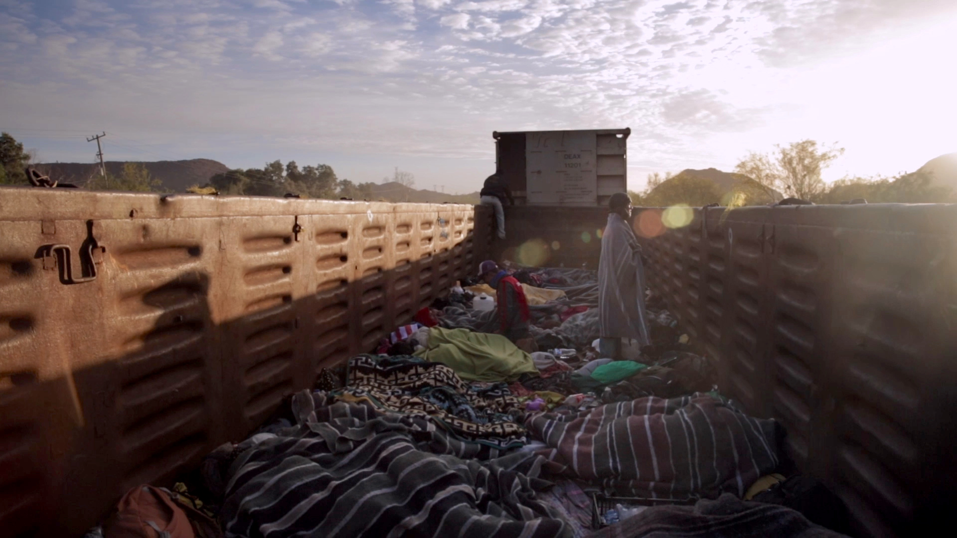 All We Carry - cargo train scene